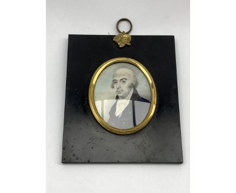 Miniature oval half length portrait of John Hunter (1746-1823), wearing a blue coat and white stock in papier mache frame 7.5