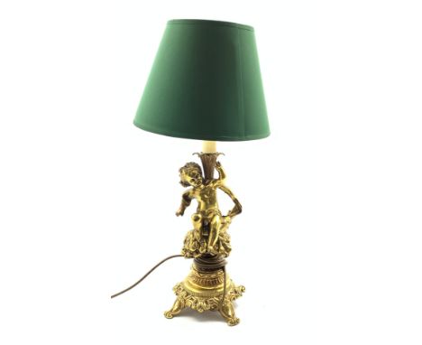 Gilt metal table lamp with cherub stem on a rococo style base H46cm excluding shade Condition Report & Further Details Click 