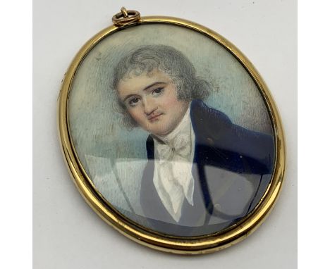Miniature oval portrait of a gentleman in a blue coat and white stock, gilt metal frame 7cm x 6cm Condition Report & Further 