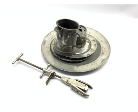 18th Century pewter charger D38cm, four smaller plates, capstan inkwell, 19th Century pewter quart mug,( altered) and a vinta