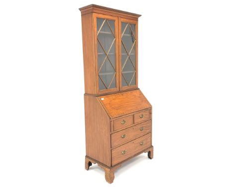 Edwardian satinwood bureau bookcase, projecting cornice above astragal gazed doors enclosing three shelves, inlaid fall front