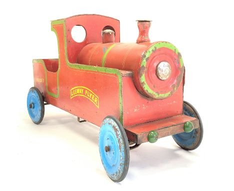 Child's Leeway pedal car modelled as a steam engine, the side reading 'PE 125.7 Leeway Flyer', complete with string pull bell
