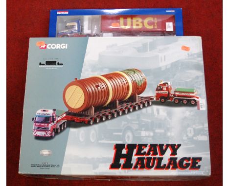 A boxed Corgi Heavy Haulage model of a Volvo FH4 axle ballasted tractor together with a boxed Corgi limited edition Scania T 