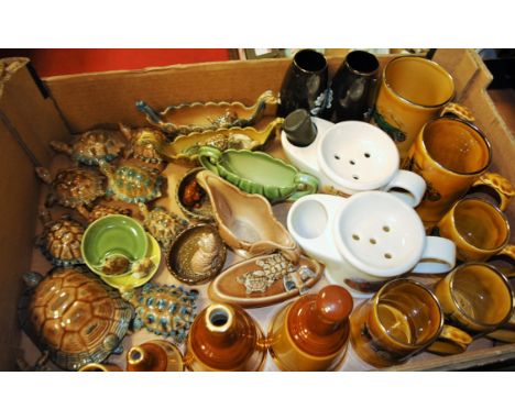 A box of assorted Wade ceramics, to include; Bell's Scotch Whisky bells, tortoise trinket jars, boat shaped vases, tankards e