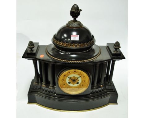 A large late Victorian black slate cased mantel clock, of architectural form, having cupola dome top with pineapple finials a