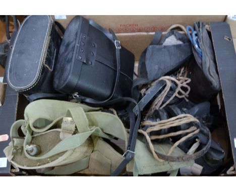 A box of miscellaneous items to include post WWII canvas webbing belt, various respirators, boxed binoculars etc   Condition 