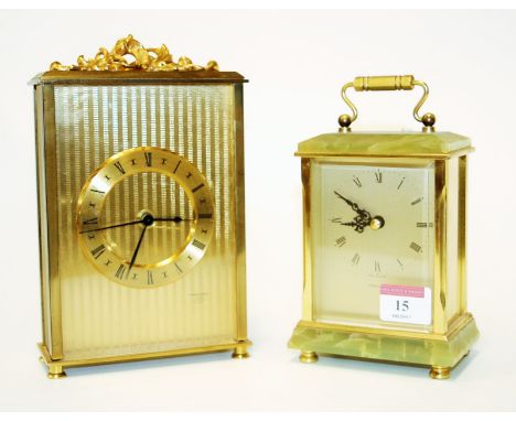A modern President lacquered brass cased mantel clock, having brass chapter ring with Roman numerals, within engine turned su