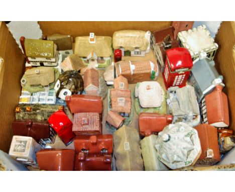 A small collection of assorted cottage ornaments to include; a Mudlen End studio pottery model of Moyse's Hall Museum in Bury