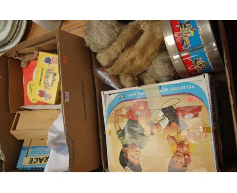 Two boxes of assorted children's toys and games to include boxed Pelham Standard  Poodle puppet, plus teddybear, boxed Interc