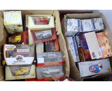 A collection of assorted boxed modern issue diecast toy vehicles to include Models of Yesteryear, 1922 S type Omnibus, Y22 19