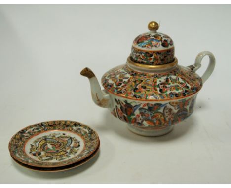 A late 19th century Chinese stoneware teapot and cover, enamel decorated with butterflies within gilt borders, h.21cm; togeth