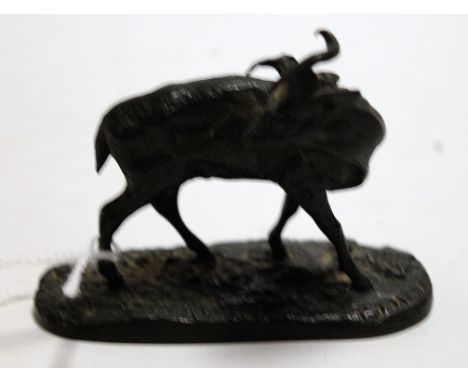 An early 20th century bronzed model of a stag in standing pose, on naturalistic base, w.8cm 