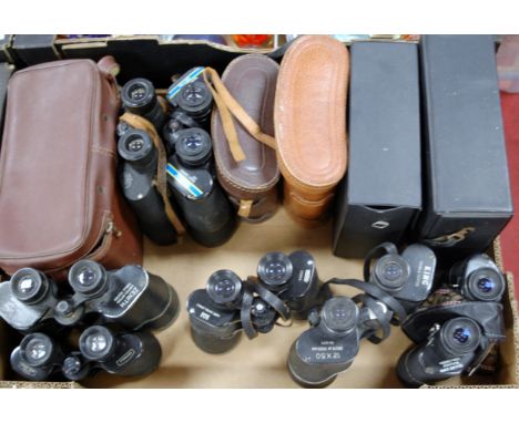 A box of assorted binoculars to include Hunter 10x40, King 12x50, Prinz 10x50, Zenith 10x50 etc (some cased)