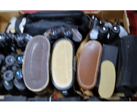 A large collection of assorted mid 20th century and later binoculars to include Super Zenith 10x50, JT Copper 8x45, Regent 10