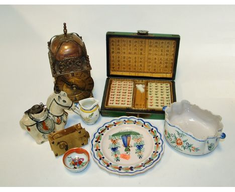 A small collection of miscellaneous items to include; brass cased lantern clock in the 17th century style, Quimper tin-glazed
