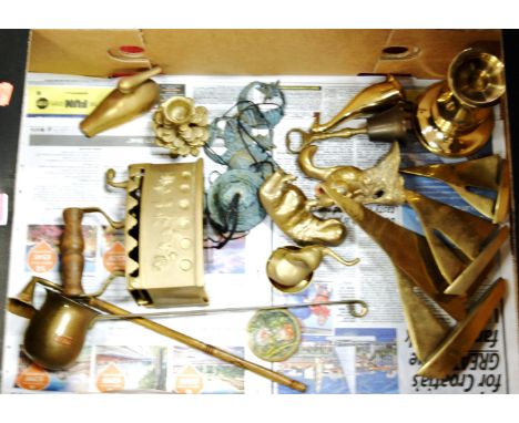 A box of assorted brass and metalware to include; flat iron, animal ornaments, ladle etc 