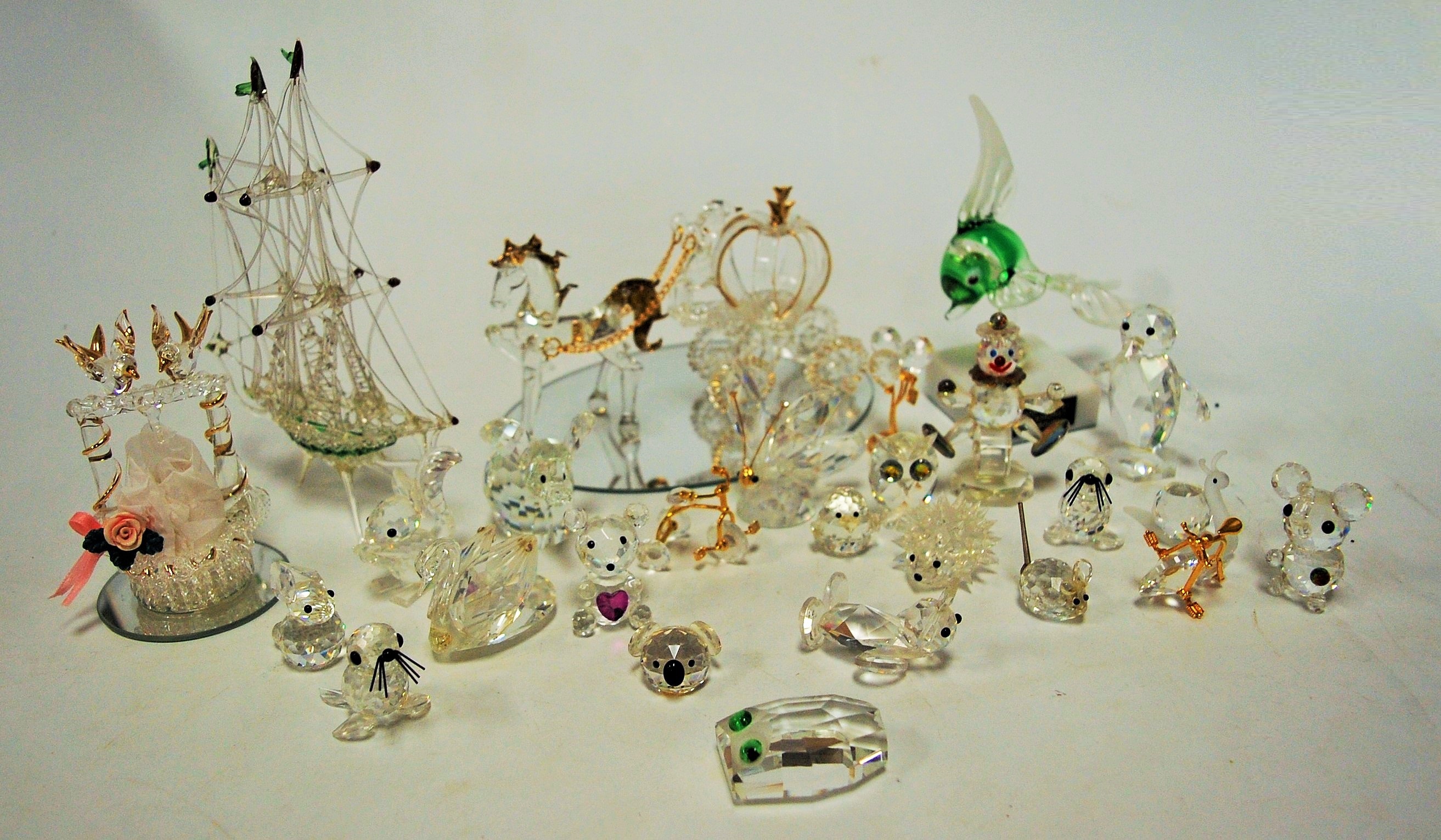 Assorted Swarovski crystal ornaments, to include various animals; and other Venetian glassware to