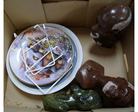 Three polished hard stone African portrait busts together with  various collectors plates