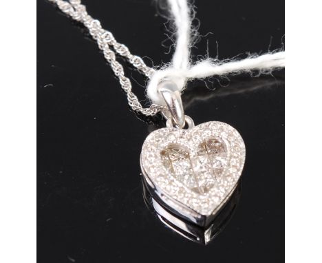 A modern 14ct white gold and diamond set heart shaped pendant, 12mm (excluding bale), on finelink neck chain
