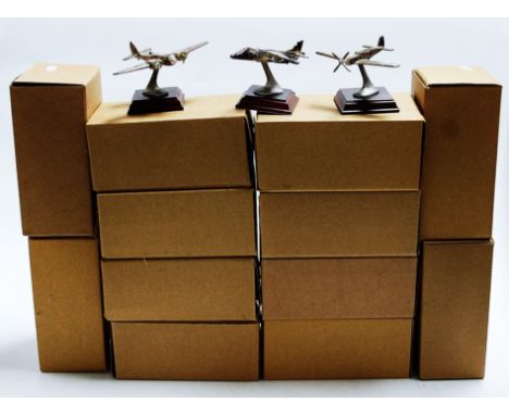 A collection of boxed Legends of the Sky model aircraft ornaments
