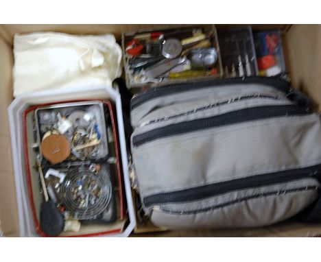 A collection of assorted watchmakers tools, parts and accessories, together with various camera lenses etc
