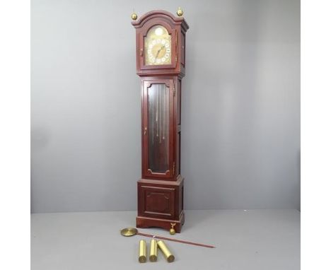 A modern mahogany cased longcase clock, with 11" brass arch top dial inscribed "Tempus Fugit", with pendulum and three weight