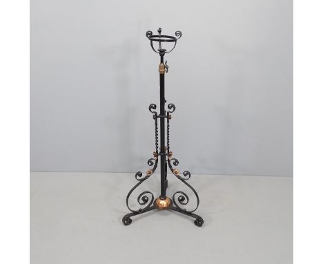 A painted wrought iron floor standing oil lamp base. Height 120cm. 