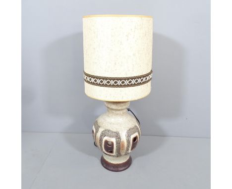 A mid-century West German pottery lamp with original shade. Height overall 84cm. 