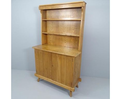 A mid-century Ercol style oak dresser with inset maker's label to back. 99x168x42cm (with key) 