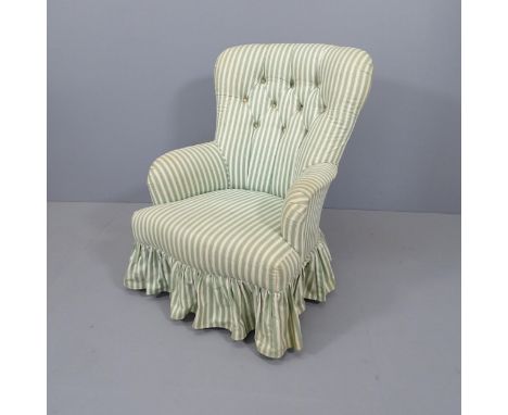 A mahogany and button back upholstered nursing chair. 