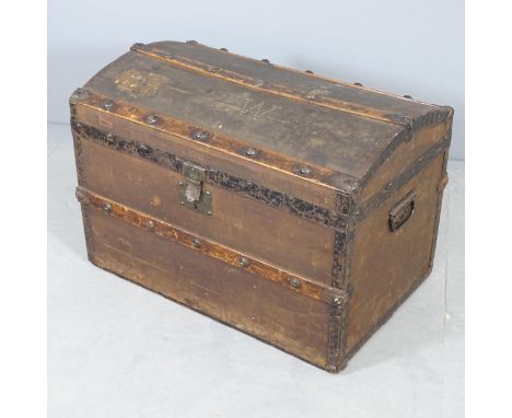 A Victorian metal-bound dome top trunk. 74x52x47cm. 