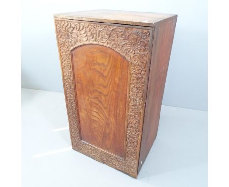 An antique gothic oak cupboard with single carved and panelled door and shelf fitted interior. 67x117x56cm. 