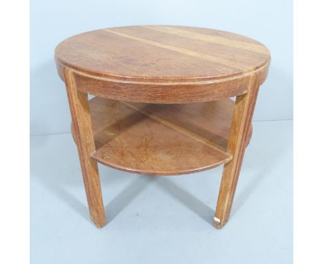 A 1930s Art Deco design circular oak coffee table, in the manner of Heals. 60x55cm. 