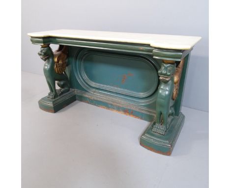 An antique green painted and marble topped hall or side table, with figural griffin supports. 100x54x34cm. Originally the upp