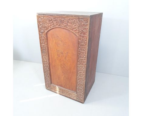 An antique gothic oak cupboard with single carved and panelled door and shelf fitted interior. 67x117x56cm. WITH THE OPTION T