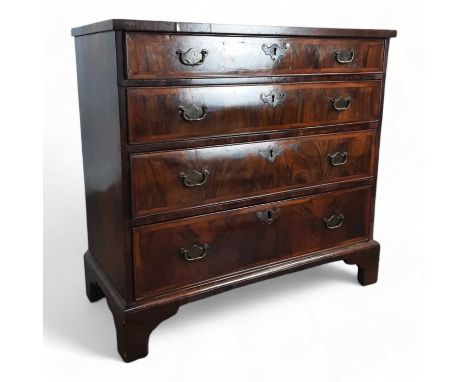 MAHOGANY BACHELOR'S CHEST, with four graduated drawers on bracket feet72cm high, 75cm wide