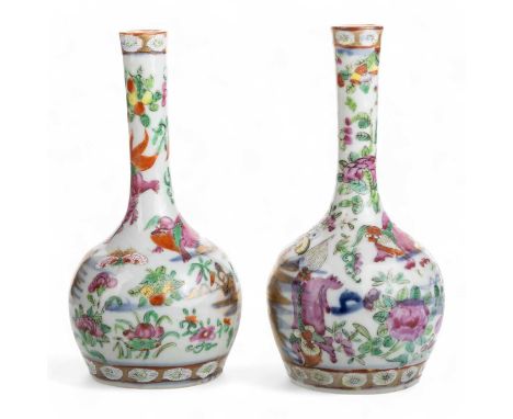 PAIR OF CHINESE FAMILLE ROSE BOTTLE VASES, LATE 19TH CENTURY painted with floral, animal and architectural designs in a famil