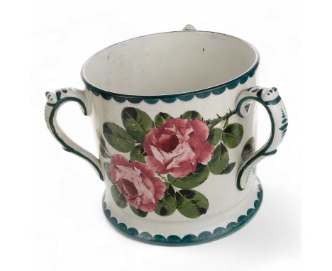 WEMYSS WARE TYG CUP, EARLY/MID  20TH CENTURY of cylindrical form with three hoop handles, painted with pink cabbage roses wit