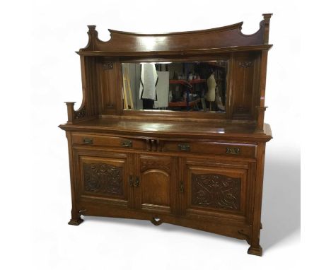 VICTORIAN OAK MIRROR BACK SIDEBOARD, with two drawers over three cupboards, with bevelled glass mirror and carved foliate det