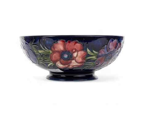 MOORCROFT BOWL, anemone pattern, of circular form, with tube lined floral decoration in shades of pink, red, purple, green an