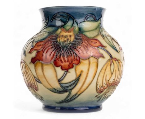 NICOLA SLANEY FOR MOORCROFT VASE, CONTEMPORARY in Anna Lilly pattern, of ovoid form, tube lined with flowers with a graduated