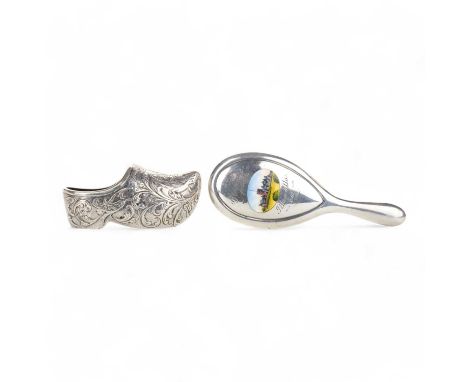 DUTCH SILVER MODEL CLOG, ALONG WITH A MINIATURE HANDMIRROR  the clog with engraved scrolling foliate decoration, the silver m