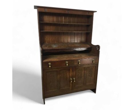 JACK GRIMBLE OF CROMER, ARTS & CRAFTS STYLE OAK DRESSER, MID-20TH CENTURY the superstructure with plain cornice over a frieze