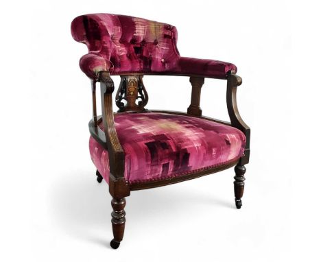 EDWARDIAN MAHOGANY TUB CHAIR, on turned legs, in pink upholstery79cm high