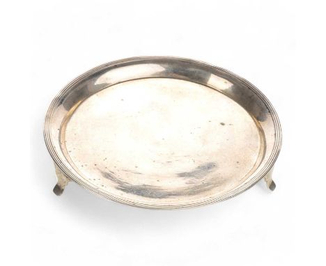 SCANDANAVIAN SILVER CARD TRAY, possibly Swedish, of circular form with reeded raised border and on three feet14cm diameterQty