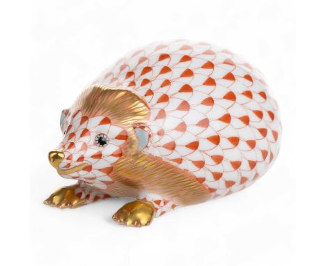 HEREND, HEDGEHOG FIGURE, CONTEMPORARY in coral fishnet pattern, with gilt highlights, marks to base10cm longCondition overall