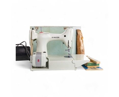 SINGER 221K SEWING MACHINE, in minty white, cased with instructions and furtherAdditional o ages available. Case has lid.