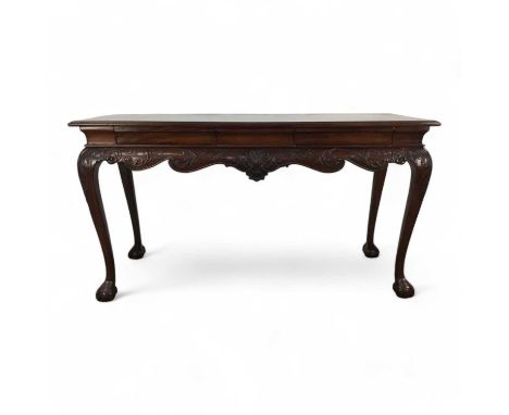 PAIR OF MAHOGANY SERVING TABLES, LATE 19TH / EARLY 20TH CENTURY each of Irish Chippendale design, with scroll decoration and 