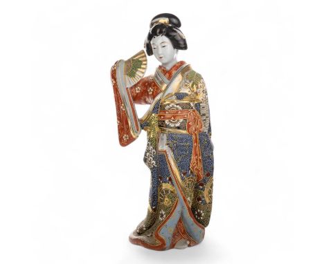 JAPANESE SATSUMA POTTERY FIGURE, LATE 19TH CENTURY / EARLY 20TH CENTURY  modelled as a geisha girl with a fan in traditional 