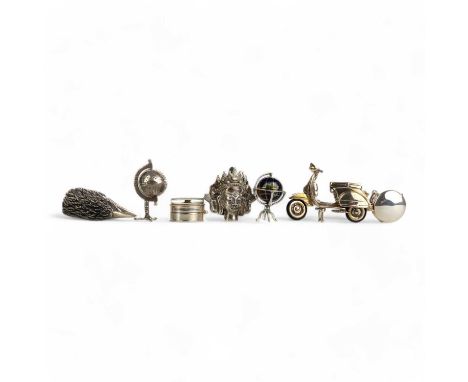 COLLECTION OF SILVER AND WHITE METAL MINIATURES, comprising two terrestrial globes, two pill boxes with compasses, a Vespa sc